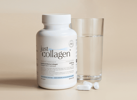 Hydrolyzed Marine Peptides Collagen with capsules and glass of water